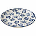 Assiette en céramique à motif floral bleu et blanc