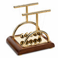 Double Pendule de Newton Décoratif Doré et Bois